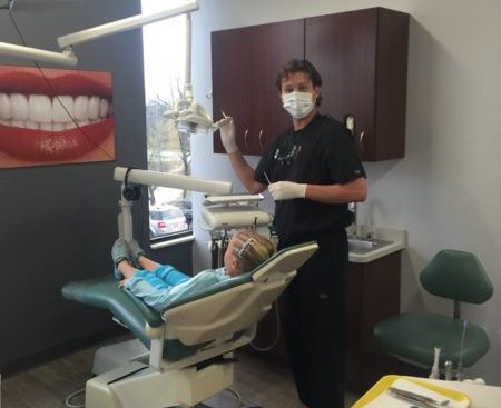 Dr. Blacher with a patient